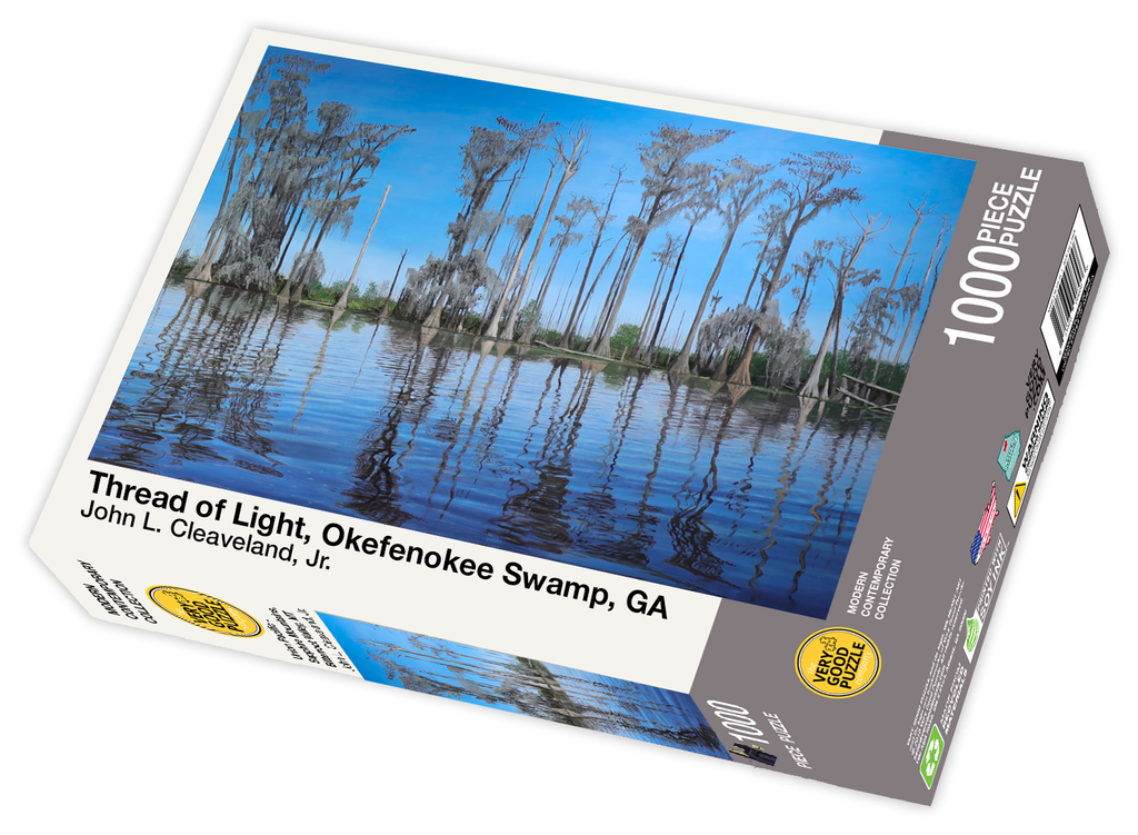VERY GOOD PUZZLE:Thread of Light, Okefenokee Swamp, GA by John Cleaveland - 1000 piece jigsaw puzzle
